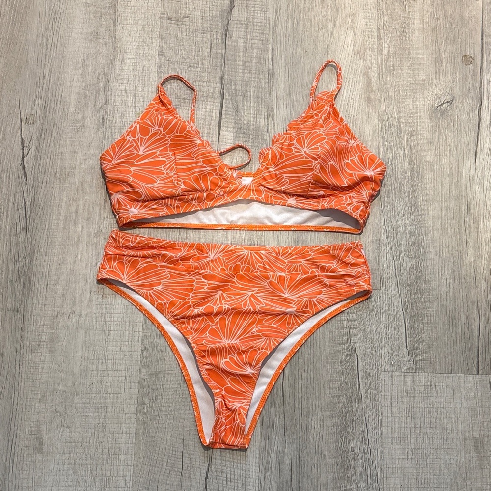 Woman’s orange flowered SHEIN bikini